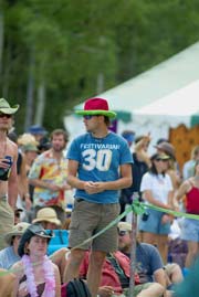 Melon-hatted festivarian